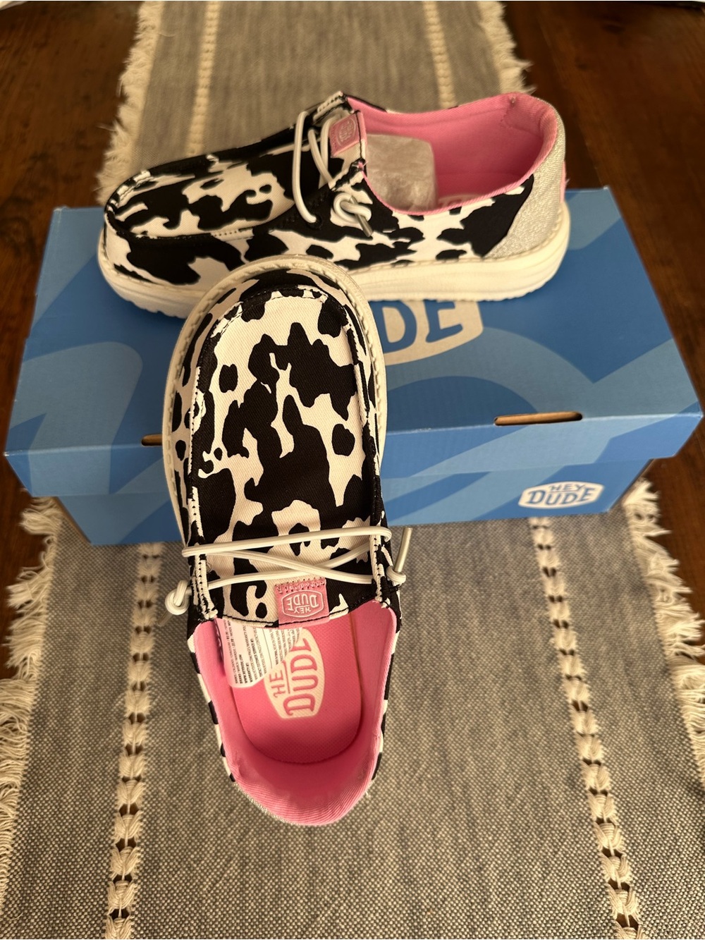 Kids' Cow Print Slip-On Shoe in Black & White with Pink Lining